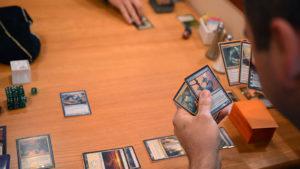 A game of Magic the Gathering being played.