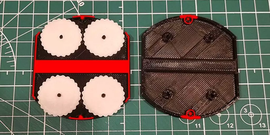 Apply glue to the Mass MTG Dry Erase Tokens top shell and bottom shell, where the red lines are.
