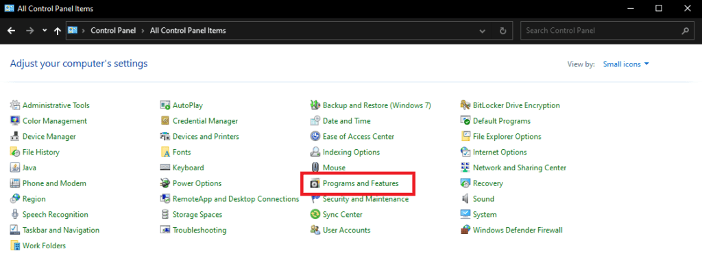 The first step to setup SMB file share on Windows is to go to the control panel and click on Programs and Features, circled in red. 