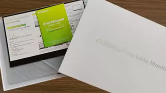 A ForHelp Portable Monitor being unboxed