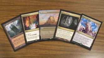 A few of the best MTG 5 color lands being displayed. Cards are Command Tower, Crystal Quarry, City of Brass, Cavern of Souls and Plaza of Heroes