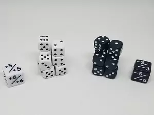 One of the basic and best MTG accessories are dice. Shown here are a set of 12mm dice in comparison to a few 16mm dice.