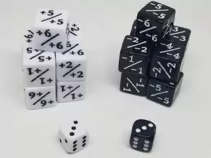 One of the basic and best MTG accessories are dice. Shown here are a set of 16mm plus/minus counter dice in comparison to a few 12mm dice.