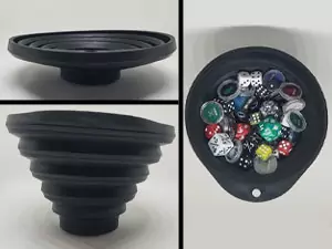 In regards to cool MTG accessories, a collapsible parts tray is the coolest. Shown here is the parts tray completely collapsed, folded out and then folded out with a bunch of dice inside of it.