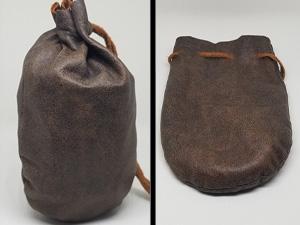 One of the basic and best MTG accessories is a dice & accessories bag. Shown here is a leather pouch, both full and empty