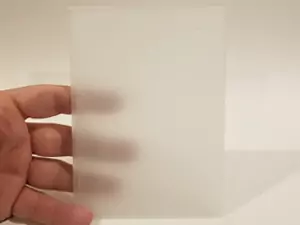 This photo shows the diffuser plate to use in the 3D printed lithophane lamp and to be inserted into the 3D printed picture frame. This was printed in clear PETG to allow more light to pass through while providing a firewall between the LEDs and the PLA 3D printed lithophane plate