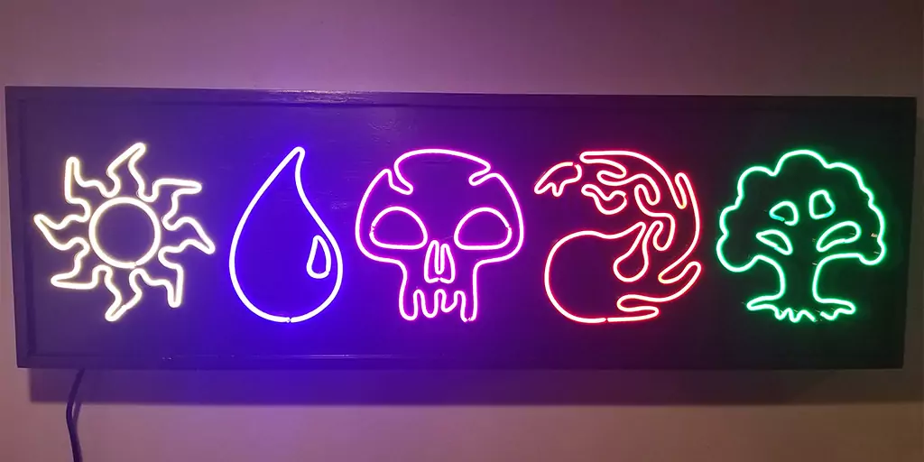 An image showing my MTG neon sign. This 3D printed neon sign is made up of an individual 3D printed light for each of the 5 mana symbols. From left to right are a white sun, a blue water drop, a purple skull, a red flame and a green tree.