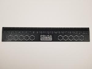 One of the most handy 3D printed tools for Americans is a metric ruler. Shown in the photo is a metric ruler printed in black and white PETG.