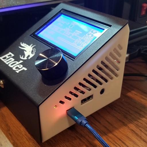 Shown in this photo is one of the Ender 3 upgrades for OctoPrint. It is an enclosure for the Le Potato single board computer sitting directly behind the Ender 3's LCD screen.