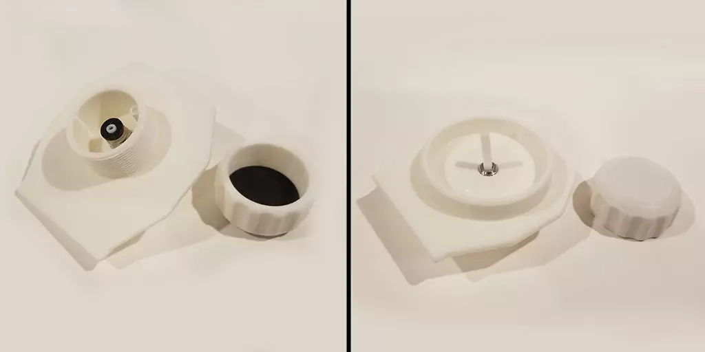 Image shows step 3 of the build process for the DIY filament drying box lid component by securing the threaded PTFE part into the lid base and then screwing the PFTE coupler into the entire piece.