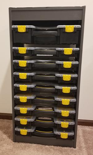 Image showing a bunch of Harbor Freight parts bins sitting inside an Ikea Trofast unit using some 3D printed rack mounts. 